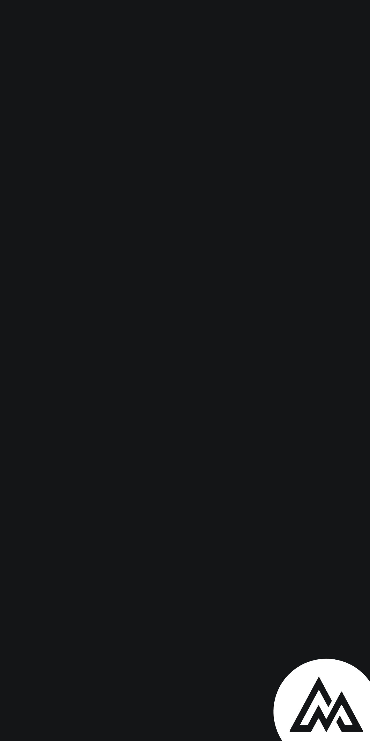 A mostly black image with a small white oval in the bottom right corner containing a simple black mountain-shaped logo, evoking subtlety and discretion—much like a well-crafted Privacy Policy.